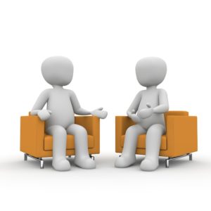 3D art image of meeting between two people. Sitting in chairs as equals.